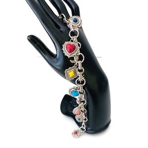 Brighton charm bracelet very colorful.  Silver.